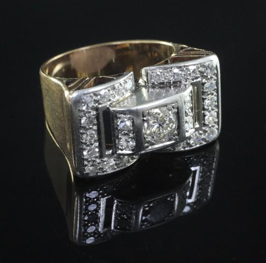 A 1940s/50s gold, platinum and diamond cluster cocktail ring, size M.